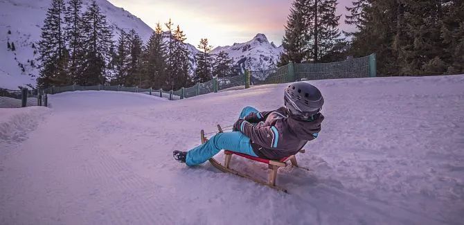 Tobogganing in Warth-Schröcken.